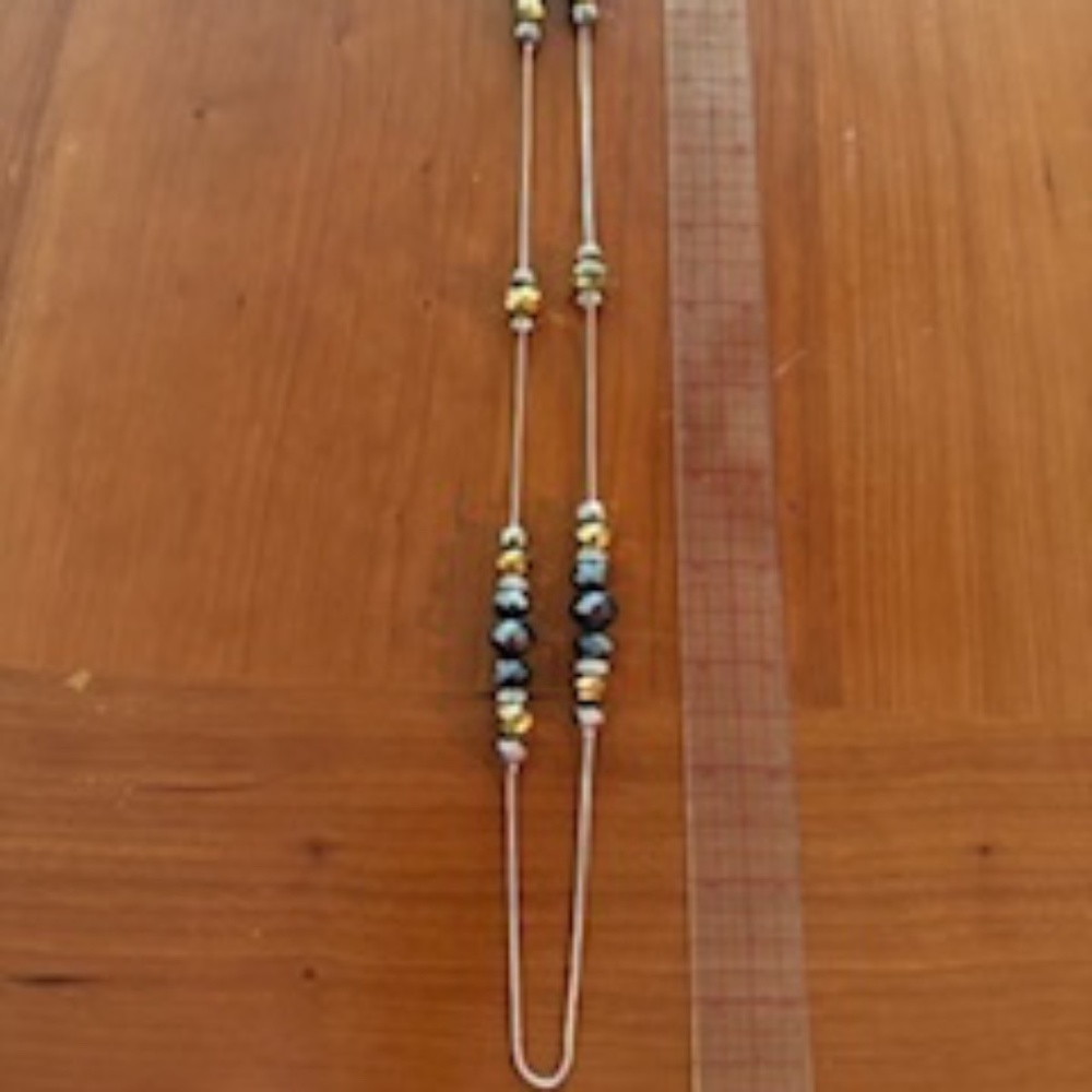 Mixed colored beads necklace with silver tones